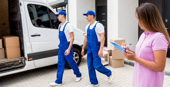 Moving team coordinating delivery while customer checks inventory list – Moving Pro Dallas